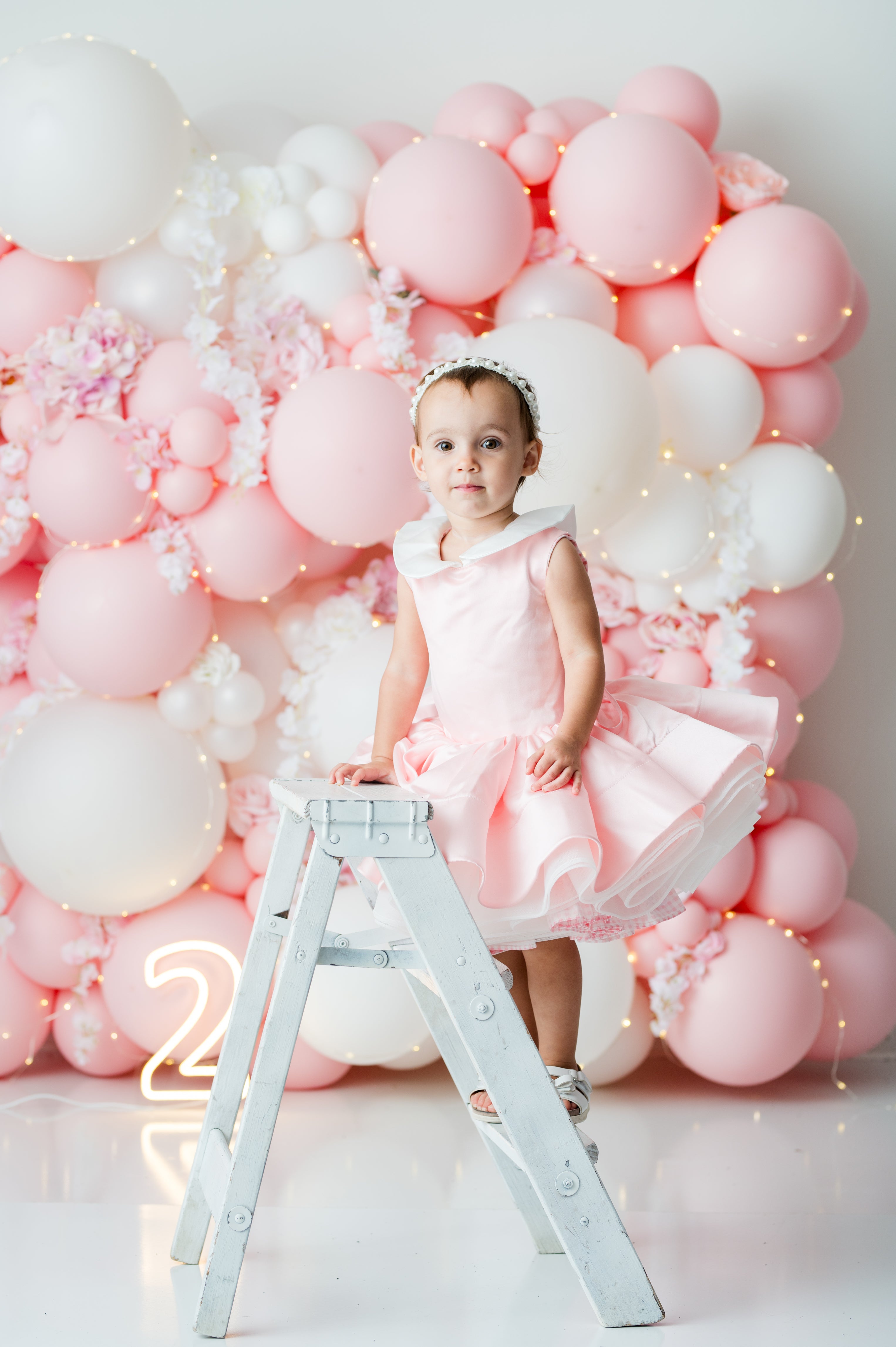 Peachy pink satin and gingham dress rental for girls