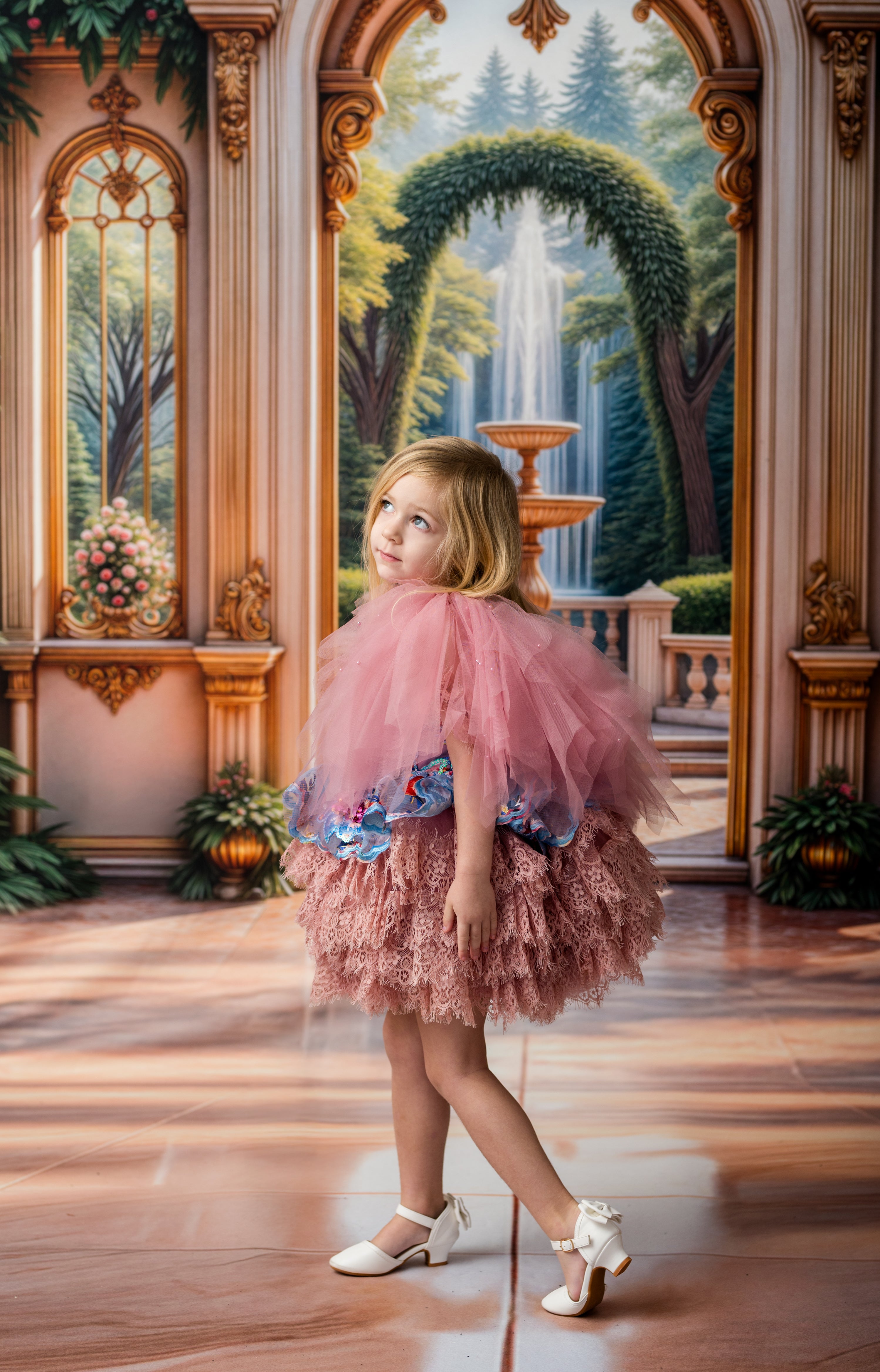Young girl in a pink dress standing in a decorated room with a large painting of a garden.