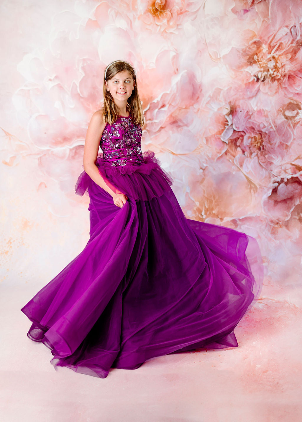 Beautiful purple couture gown ideal for special events and photography.








