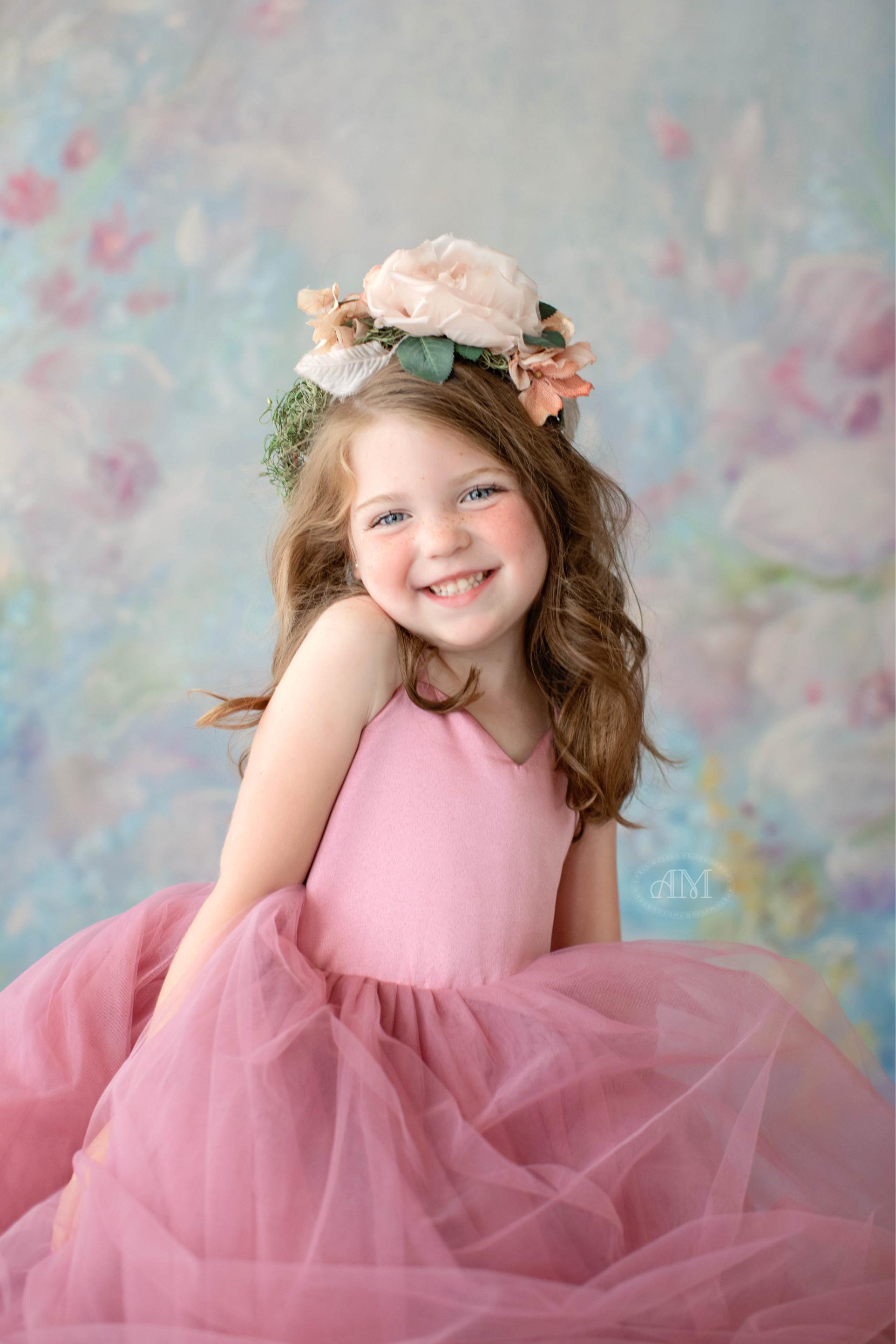 Chic and timeless flower girl dress, designed to complement the bride's vision.