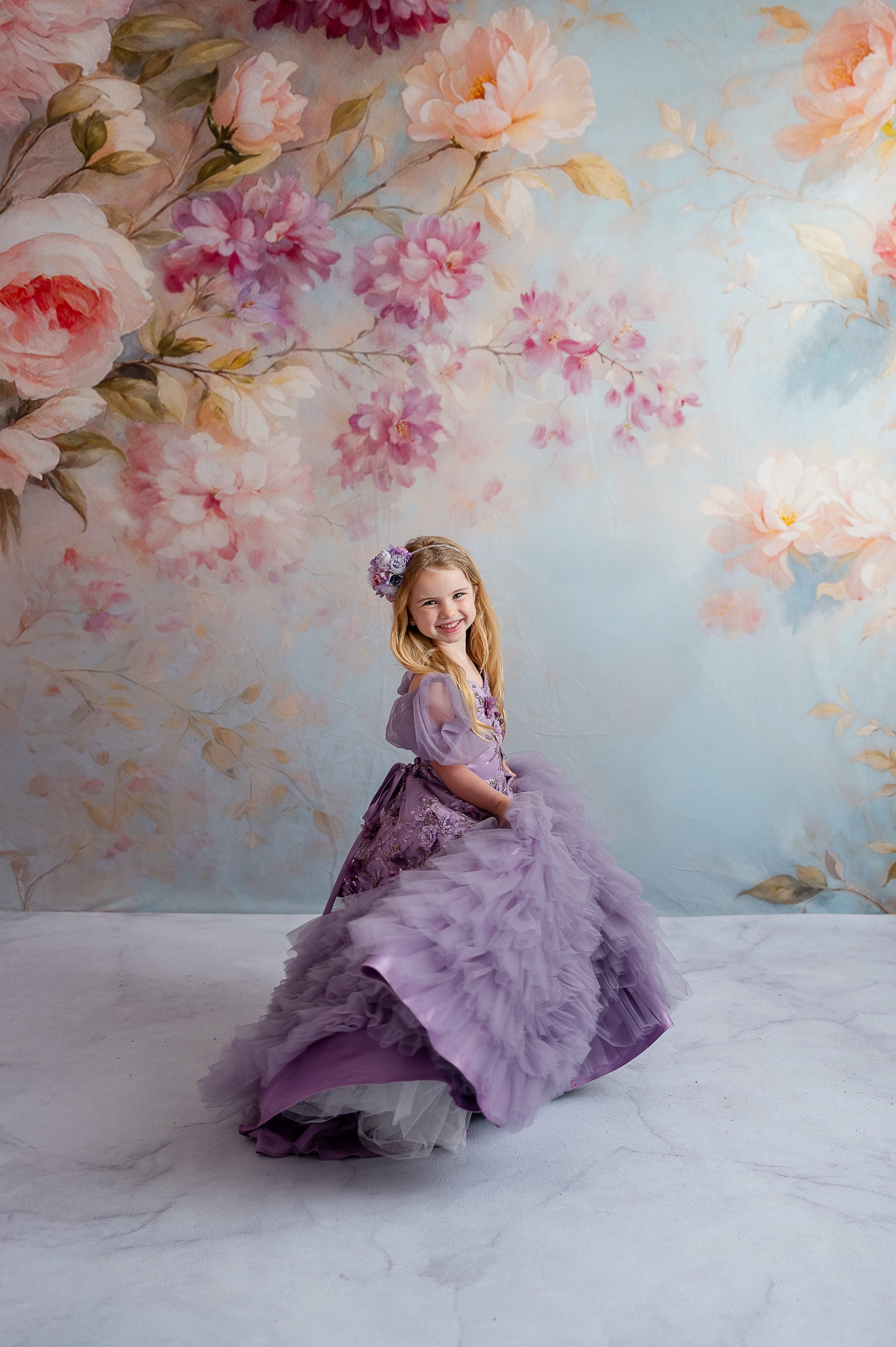 Lavender floor-length gown with detachable puff sleeves styled for a child’s fantasy photo shoot.

