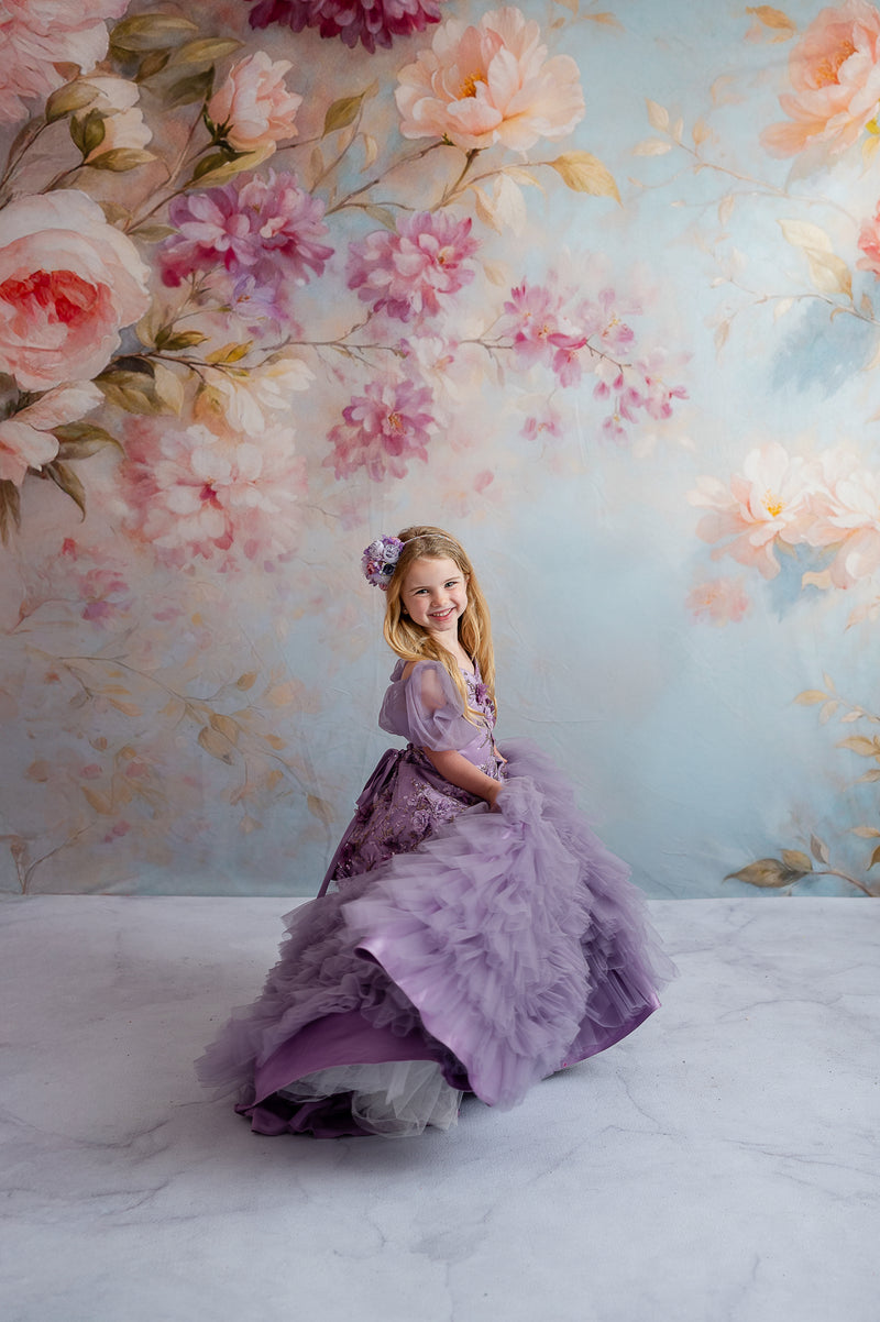 Lavender floor-length gown with detachable puff sleeves styled for a child’s fantasy photo shoot.

