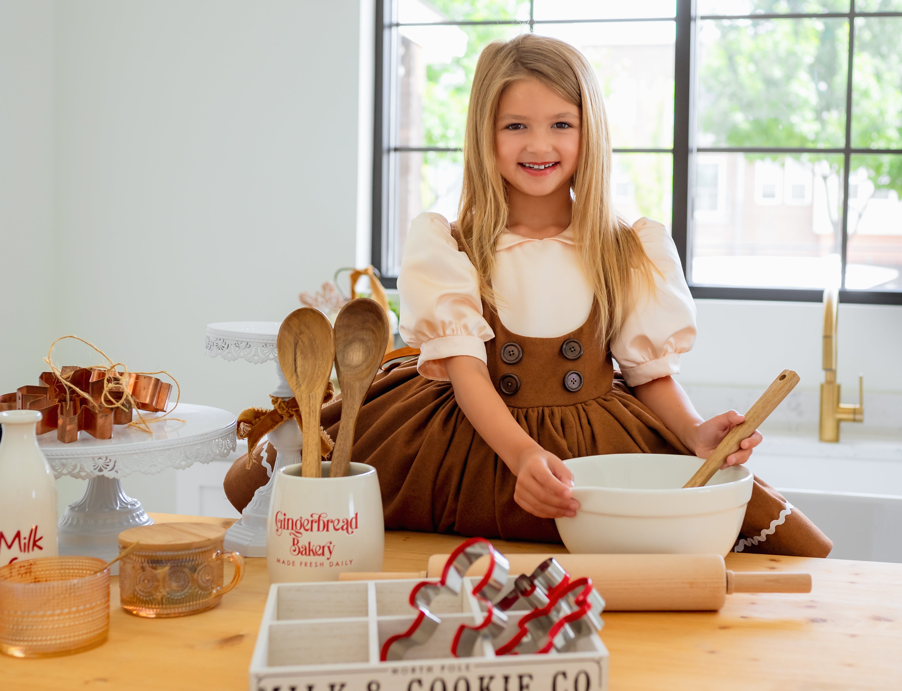 girl baking gingerbread cookies