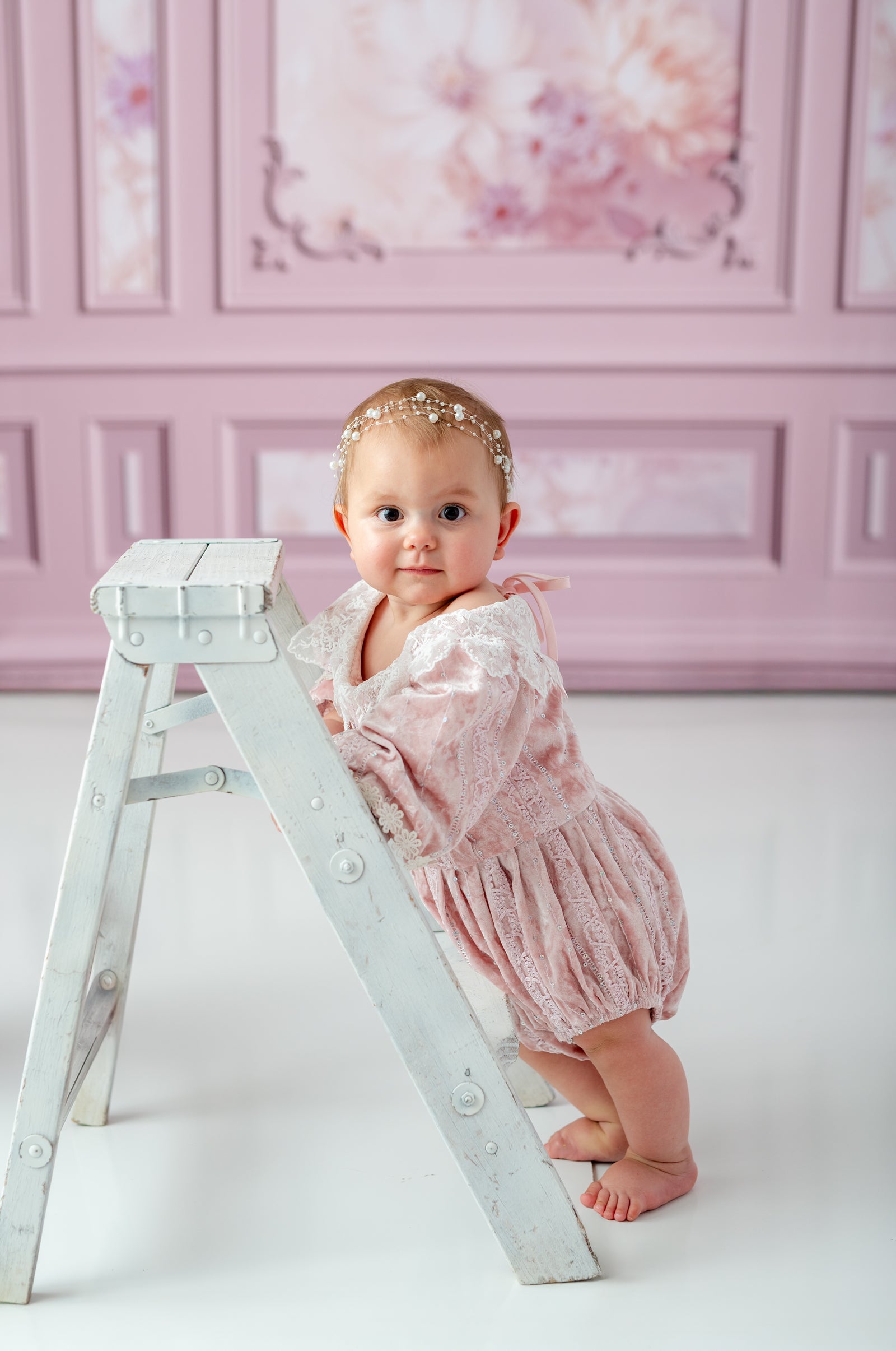 Styled session featuring blush velvet baby romper

