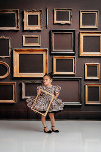 "This leopard print dress is the ultimate statement for little girls' birthday parties and unique photography sessions."






