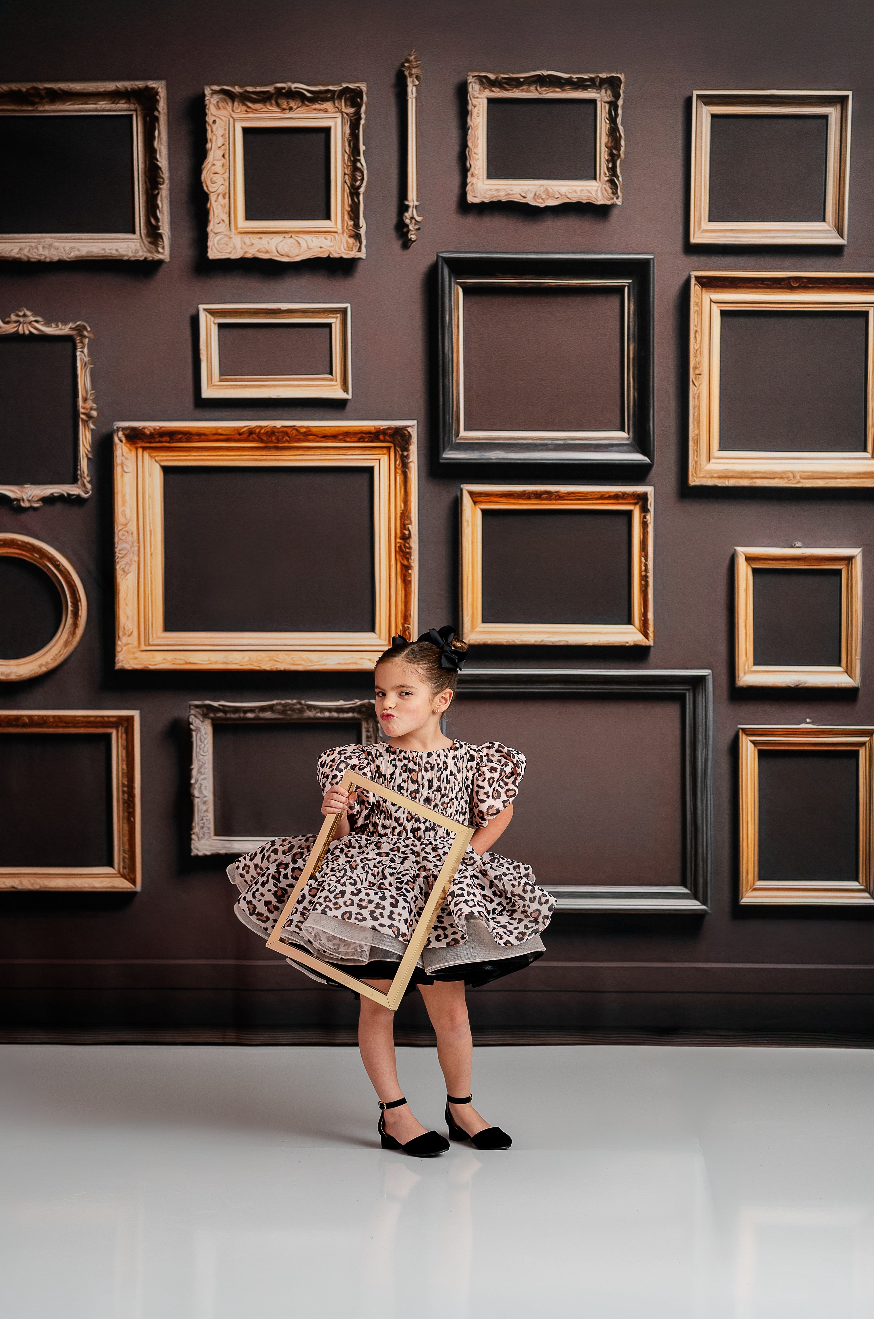 "This leopard print dress is the ultimate statement for little girls' birthday parties and unique photography sessions."






