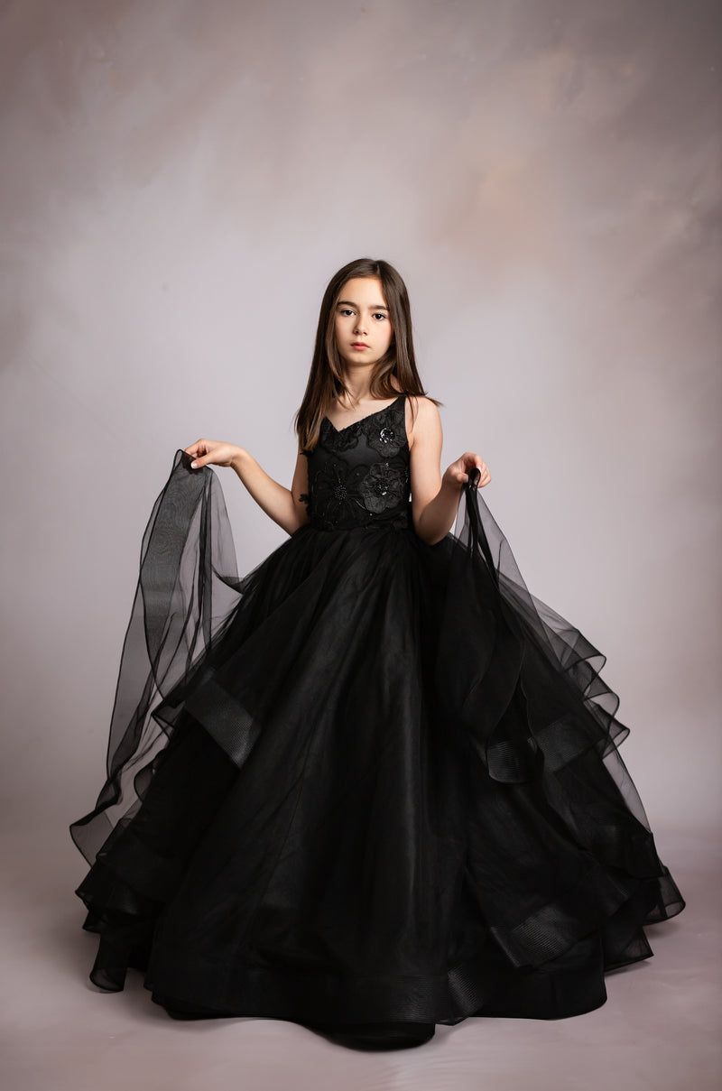 "Young girl twirling in the Seraphina Grace gown, ideal for birthday and milestone photos"

