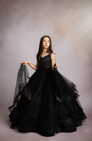 "Young girl twirling in the Seraphina Grace gown, ideal for birthday and milestone photos"

