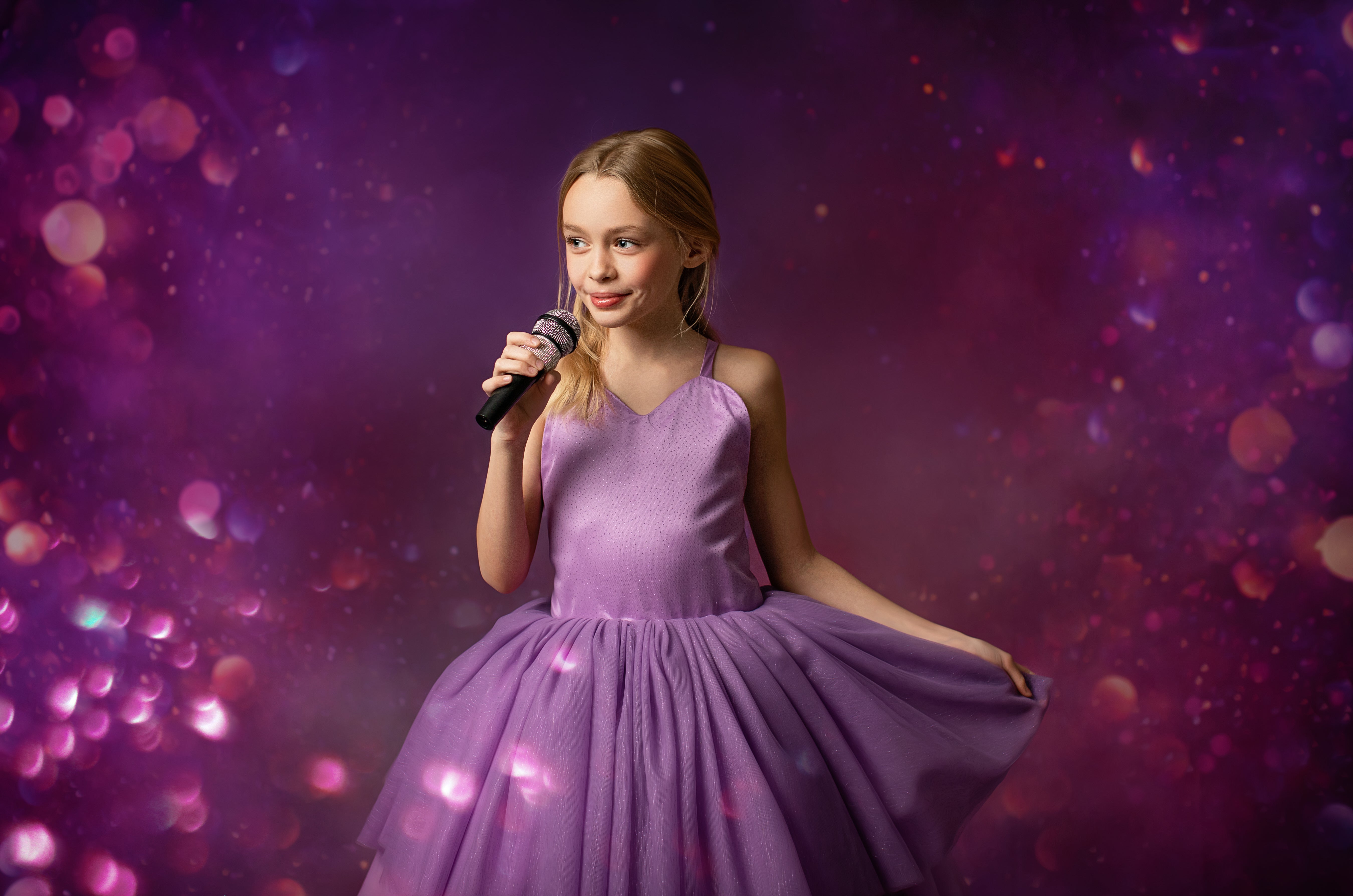 Singing girl in purple dress