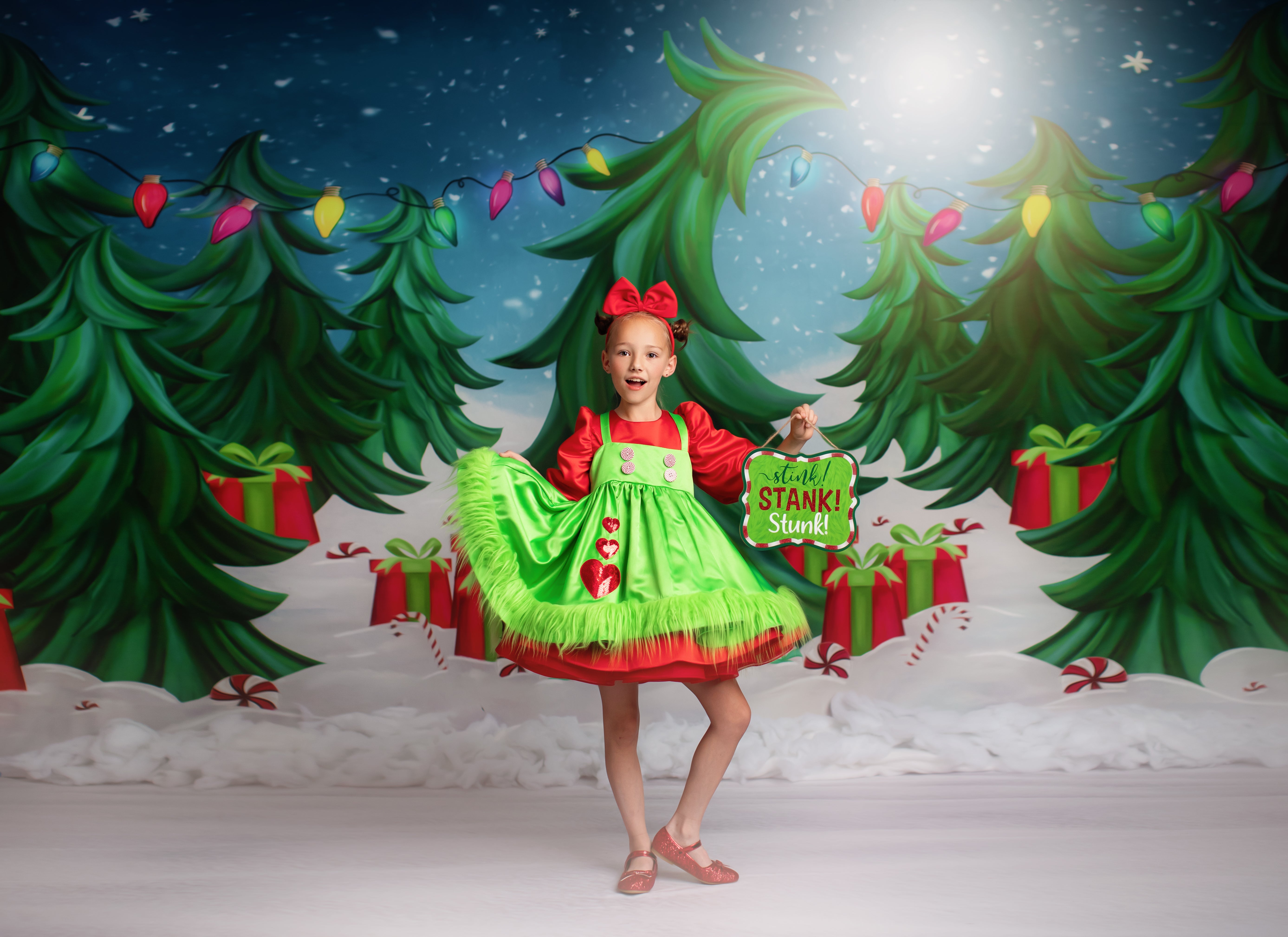 Festive children’s holiday attire featuring bright colors, fluffy trim, and playful patterns, perfect for Christmas photography.
