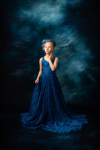 Girl wearing Everly Dress with floral crown for spring shoot

