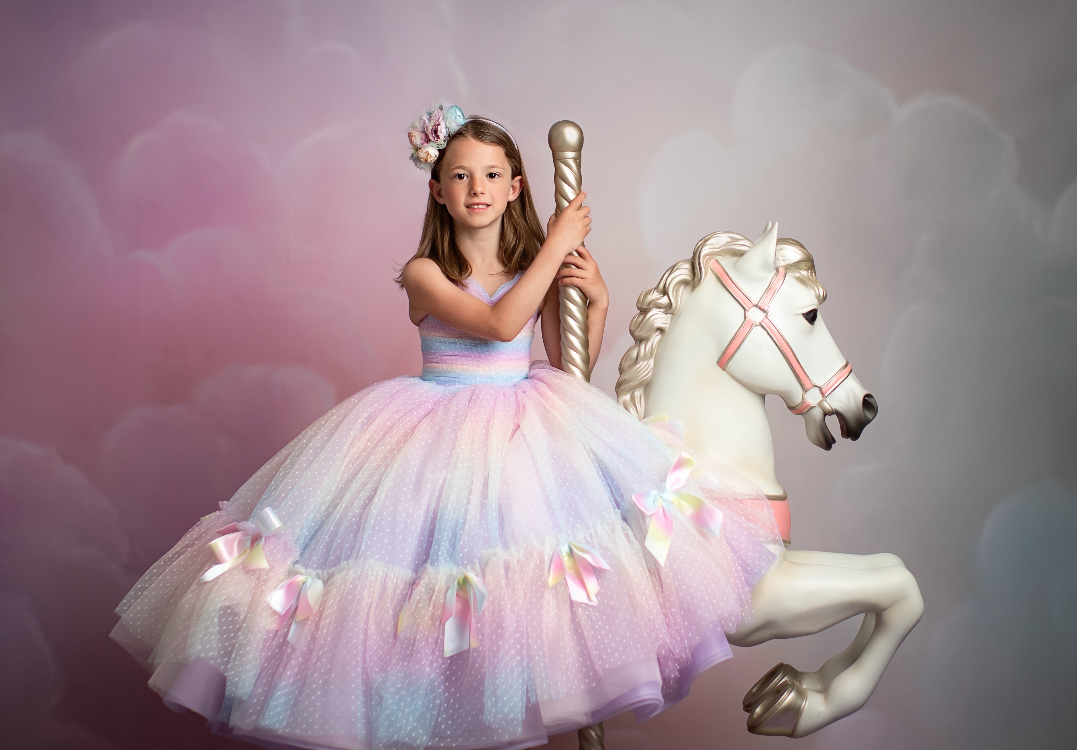 "Graceful motion shot of the Addison Gown highlighting the airy bridal tulle skirt"


