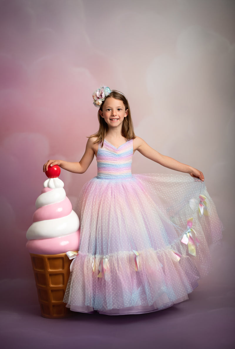 "Couture lace gown with floor-sweeping skirt and classic silhouette for formal portraits"

