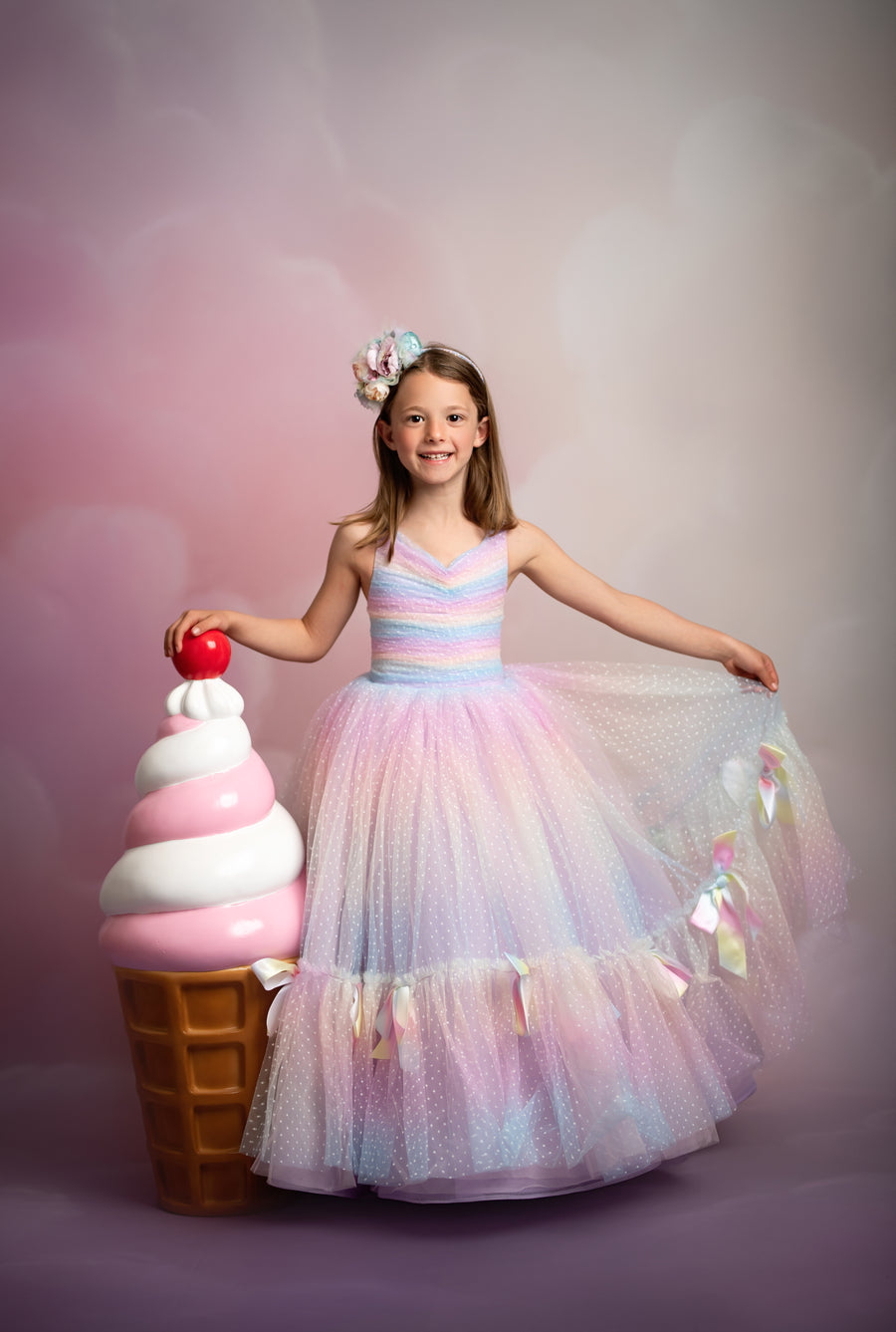 "Couture lace gown with floor-sweeping skirt and classic silhouette for formal portraits"

