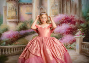 Child wearing Bentley + Lace Princess gown in pastel satin with apron overlay


