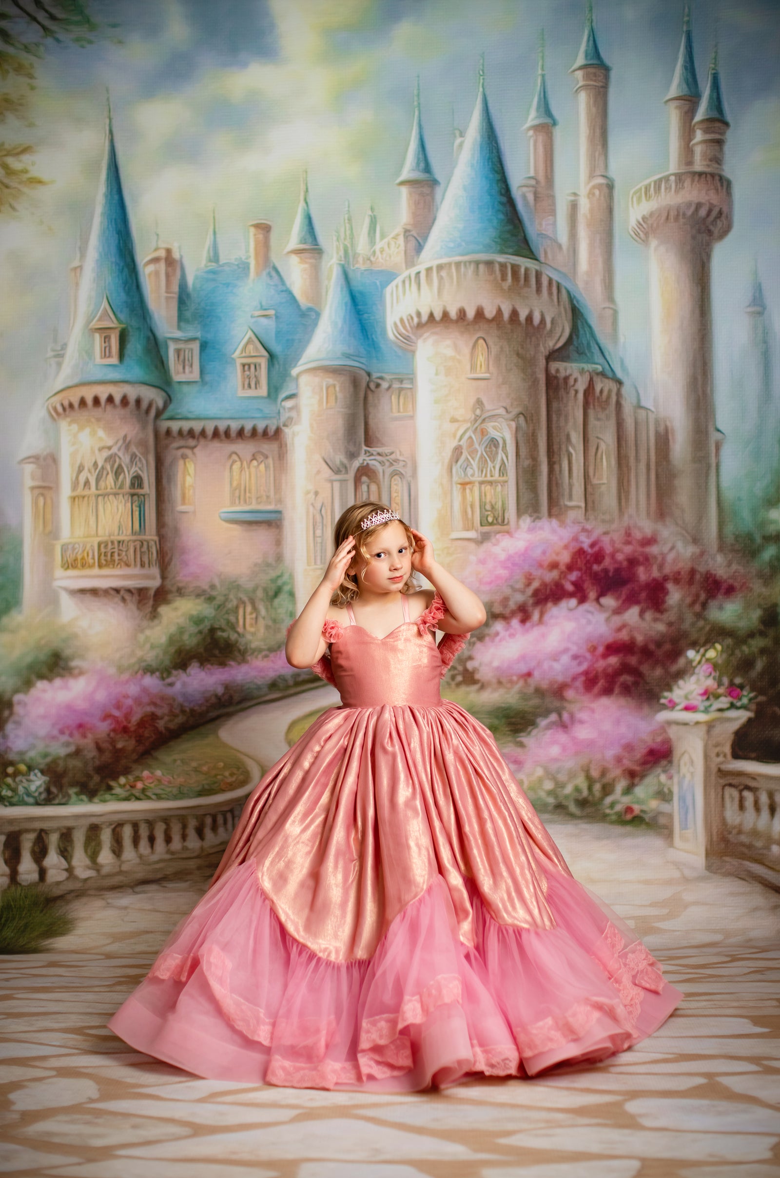 Floor-length satin Princess gown with apron overlay on child model in natural light

