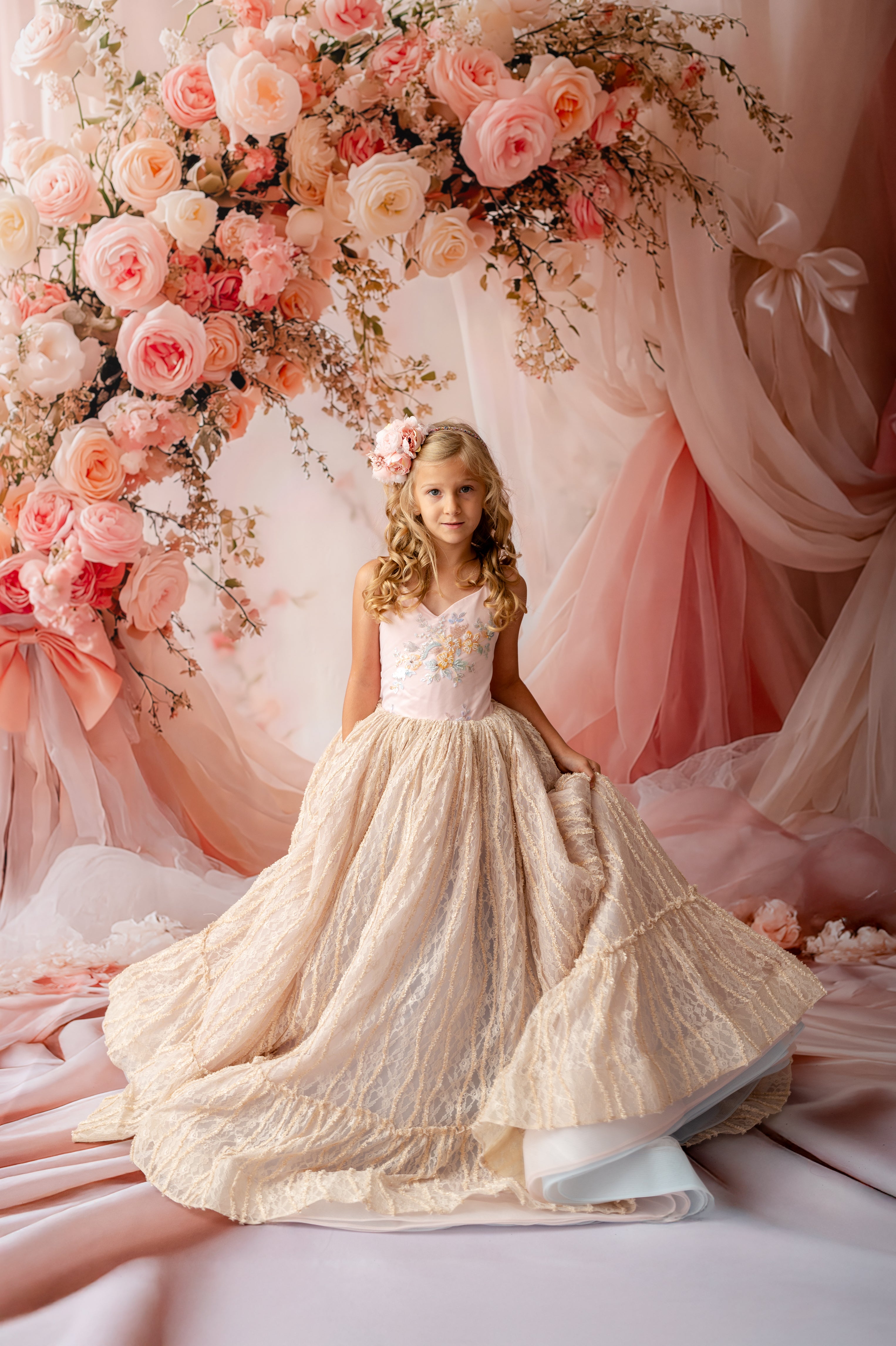 "Elegant flower girl dress with embroidered bodice and flowing lace skirt"