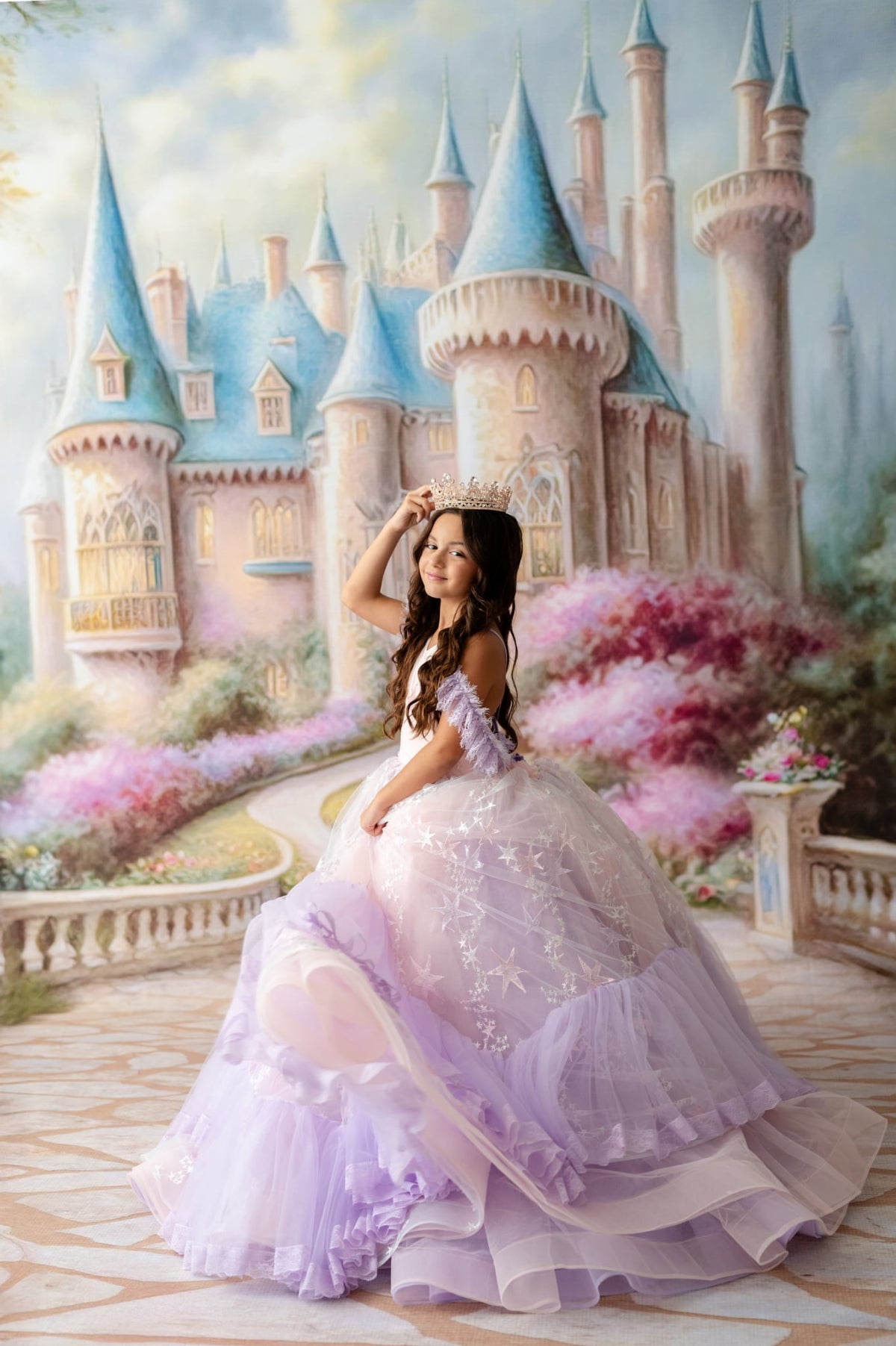 Woman in a purple gown posing in front of a fairy-tale castle