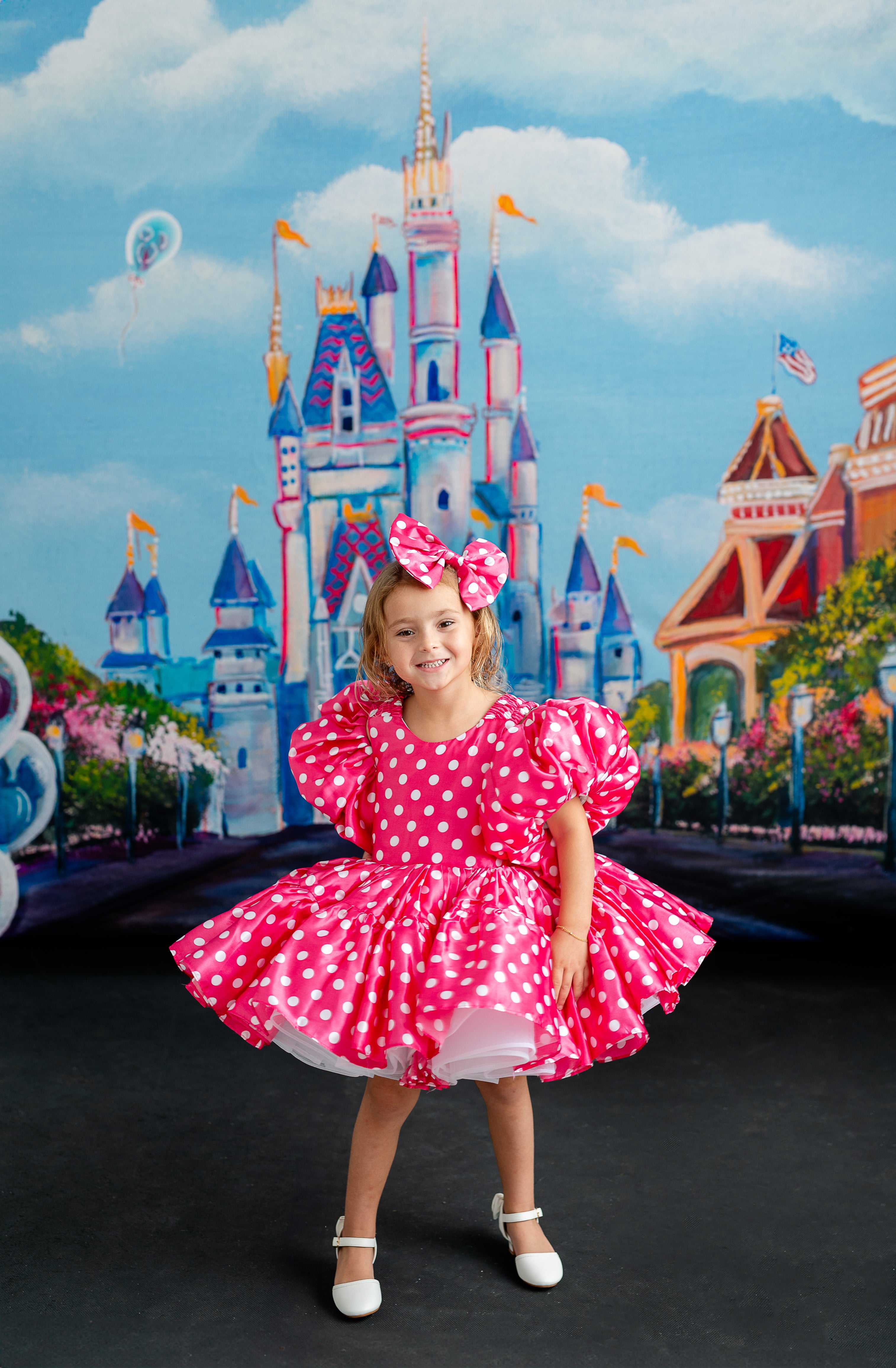 Lovely pink and white polka dot dress, complete with a gathered waist and flowing skirt, ideal for a fun and feminine look.