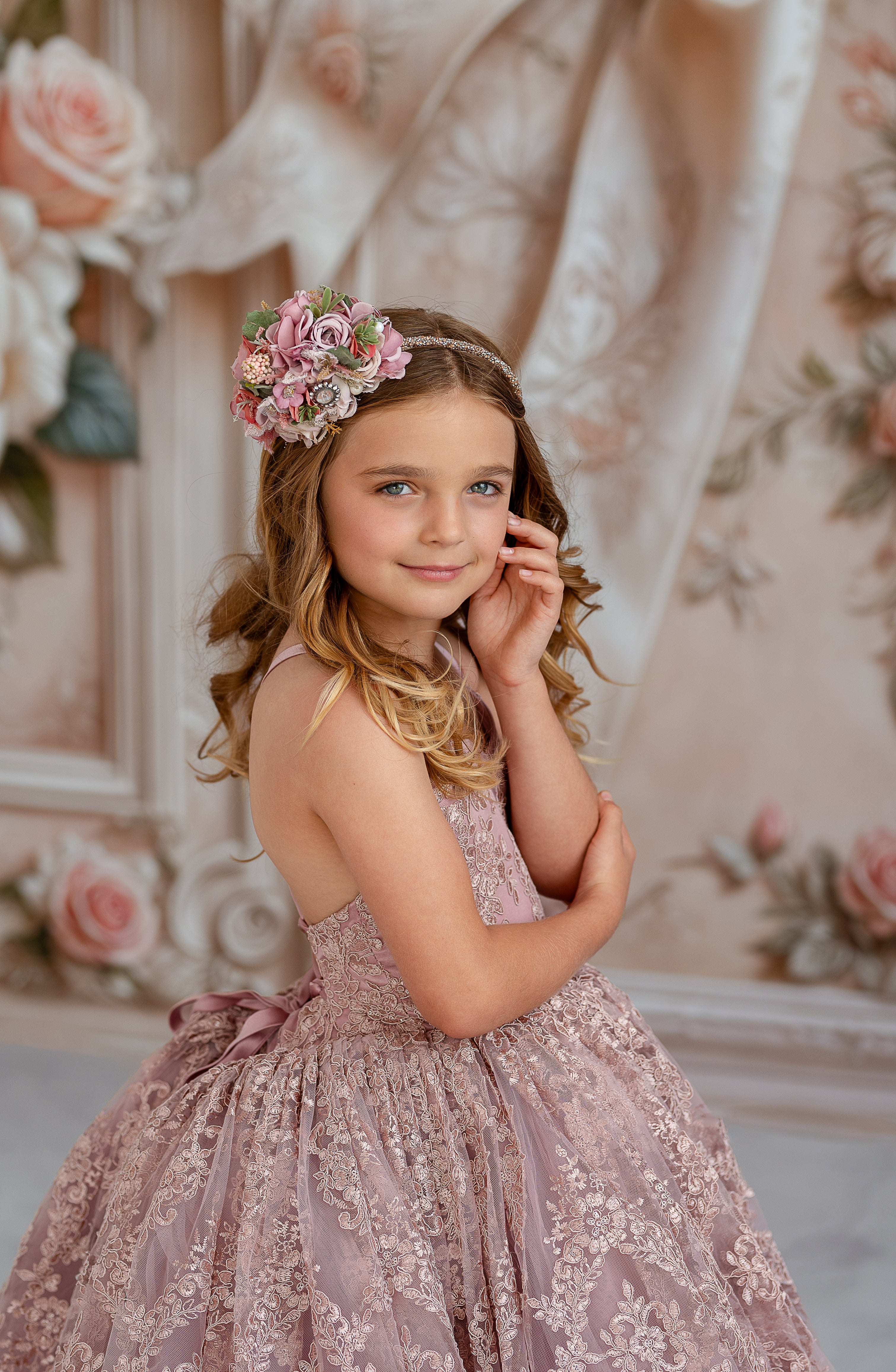 "Graceful couture dress featuring a fitted bodice with shimmering lace and a flowing skirt"

