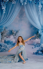 Editorial fashion gown with romantic vintage design in solid tone.

