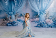 Side view of couture Hillary gown with split front and sheer overlay.

