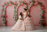 Detail shot of structured bodice and flowing skirt of Sugar Rosette dress