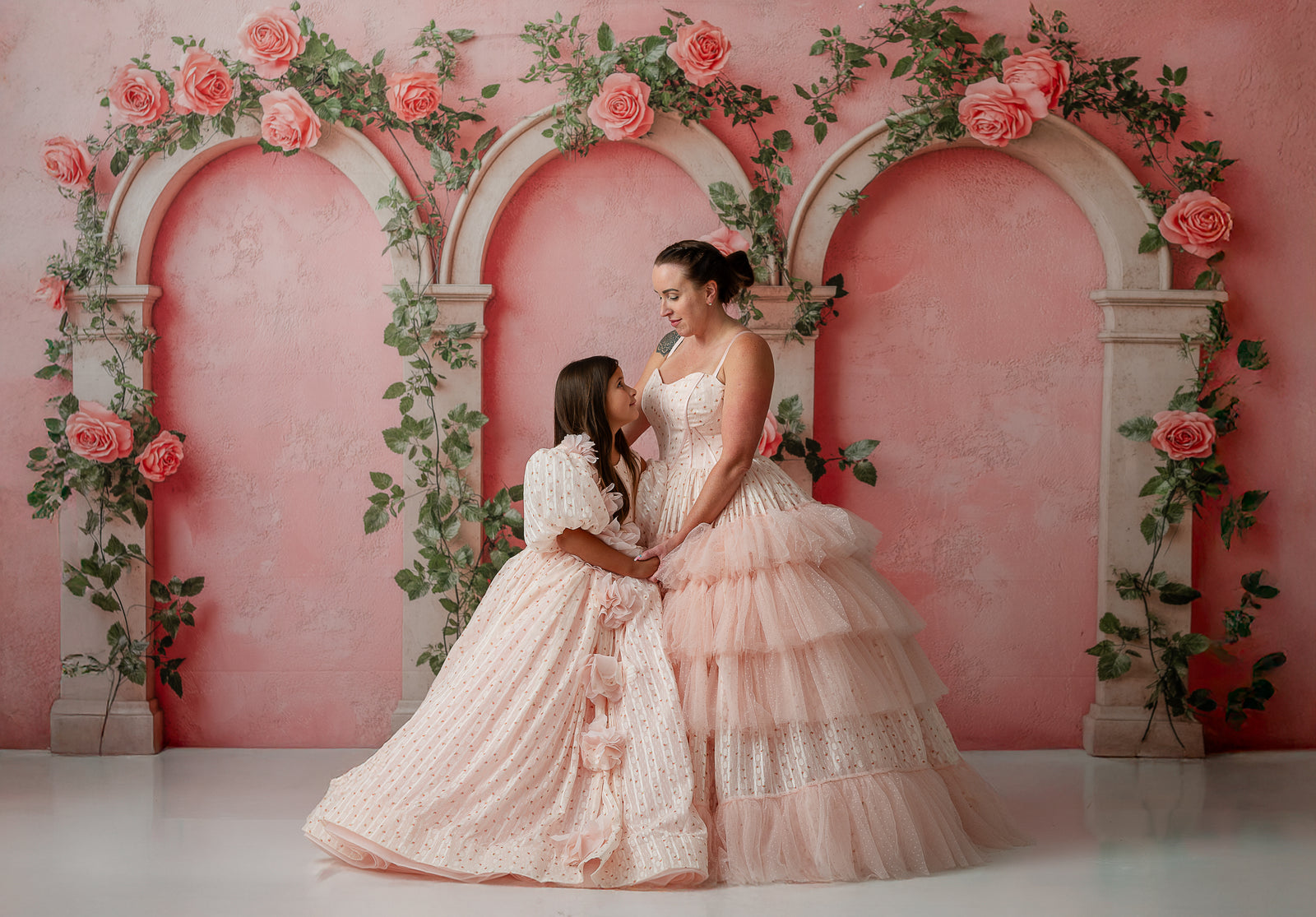 Detail shot of structured bodice and flowing skirt of Sugar Rosette dress