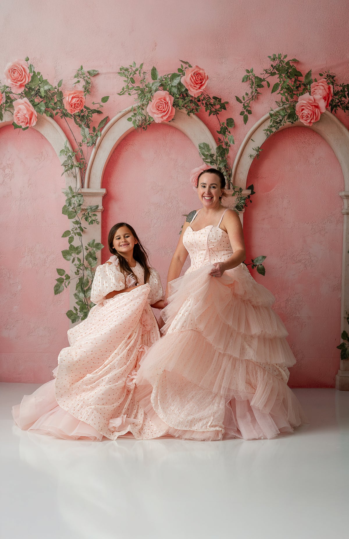 Model twirling in Sugar Rosette gown, showing textured layers and silhouette