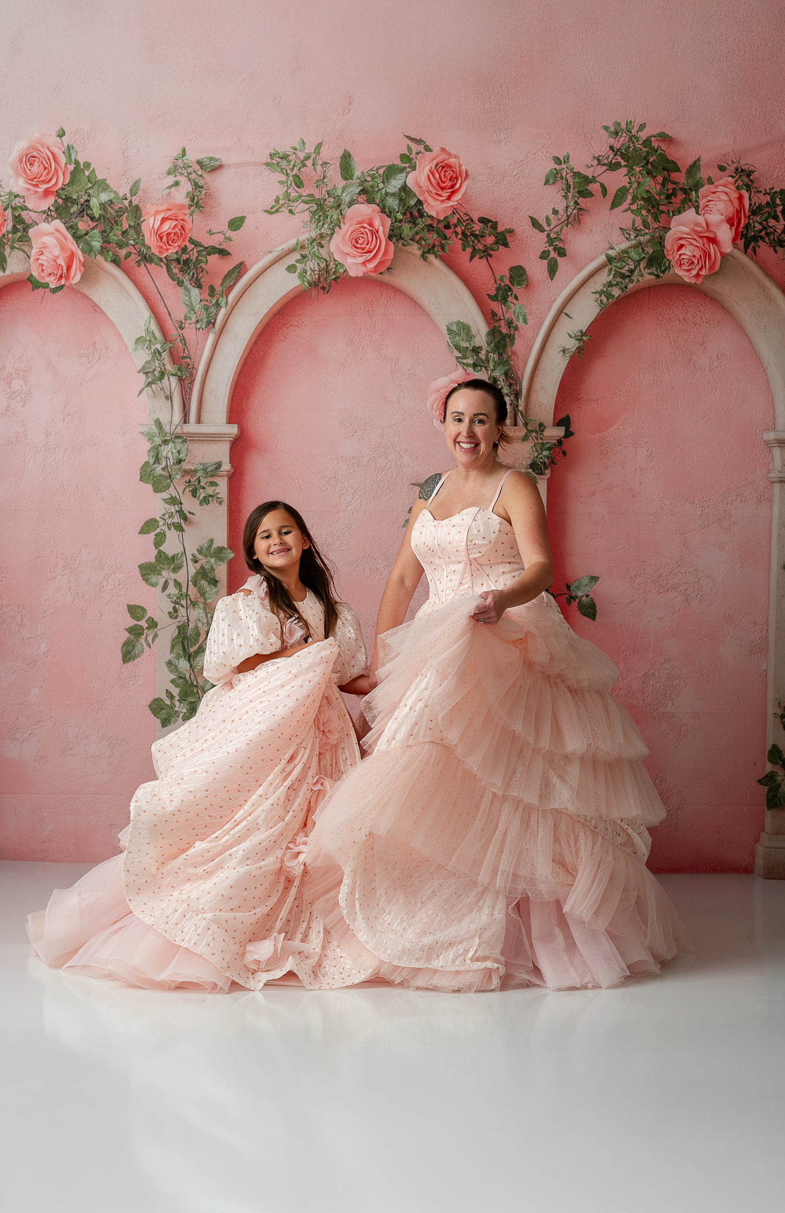 Model twirling in Sugar Rosette gown, showing textured layers and silhouette