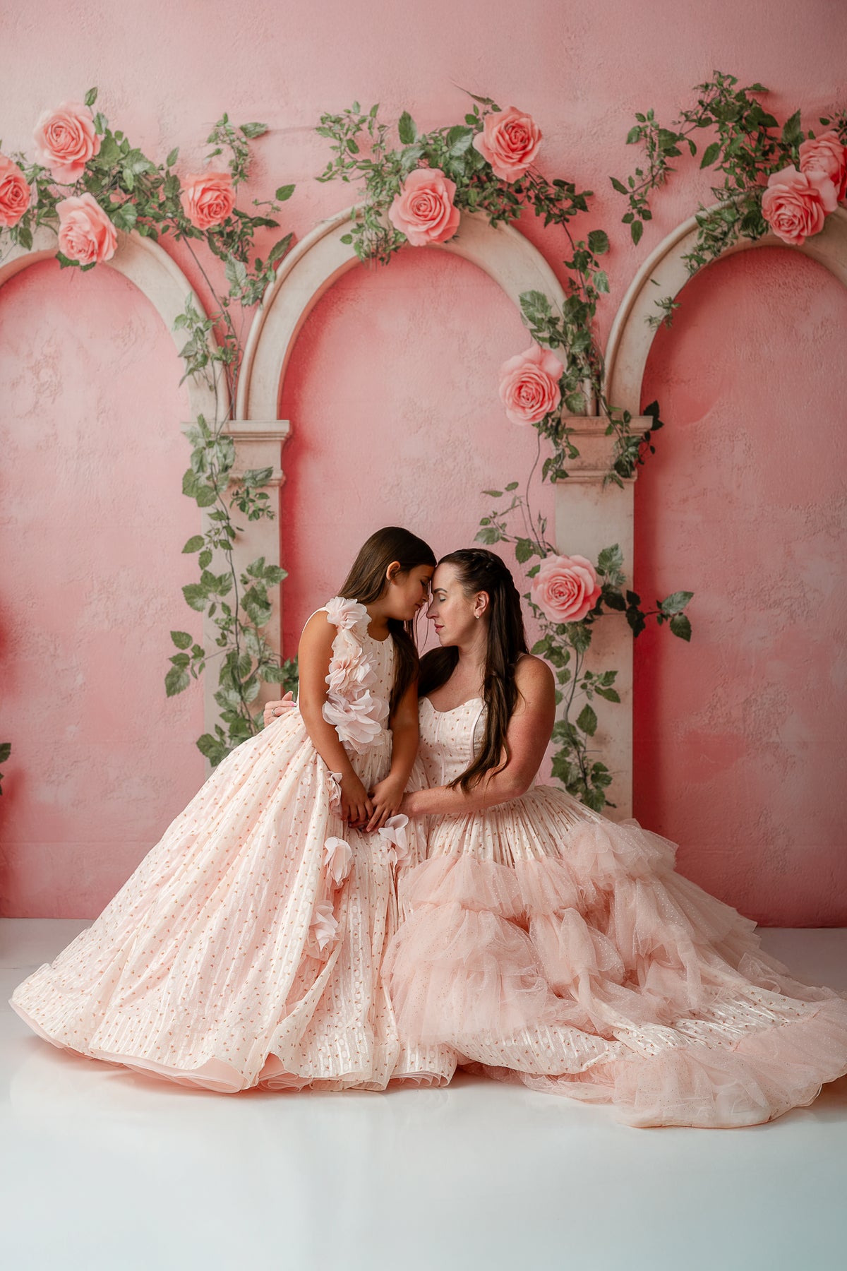 Twinning moment with Sugar Rosette dresses featuring corset backs and chiffon layers