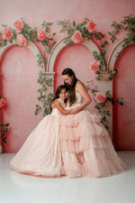 Full-length view of Mommy and Me Sugar Rosette gowns styled for a fine art session