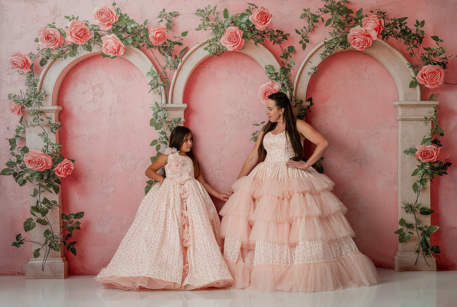mommy and mel posing in Sugar Rosette gown for whimsical garden portrait session

