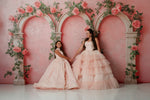 Detail of flowing chiffon skirts on matching Mommy and Me Sugar Rosette gowns


