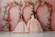 Detail of flowing chiffon skirts on matching Mommy and Me Sugar Rosette gowns

