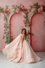 Soft chiffon detachable sleeves styled off-shoulder on young girl in Sugar Rosette dress

