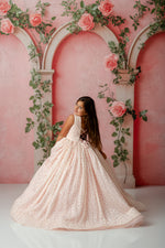 Back detail of Sugar Rosette gown showing hidden stretch panel for flexible fit

