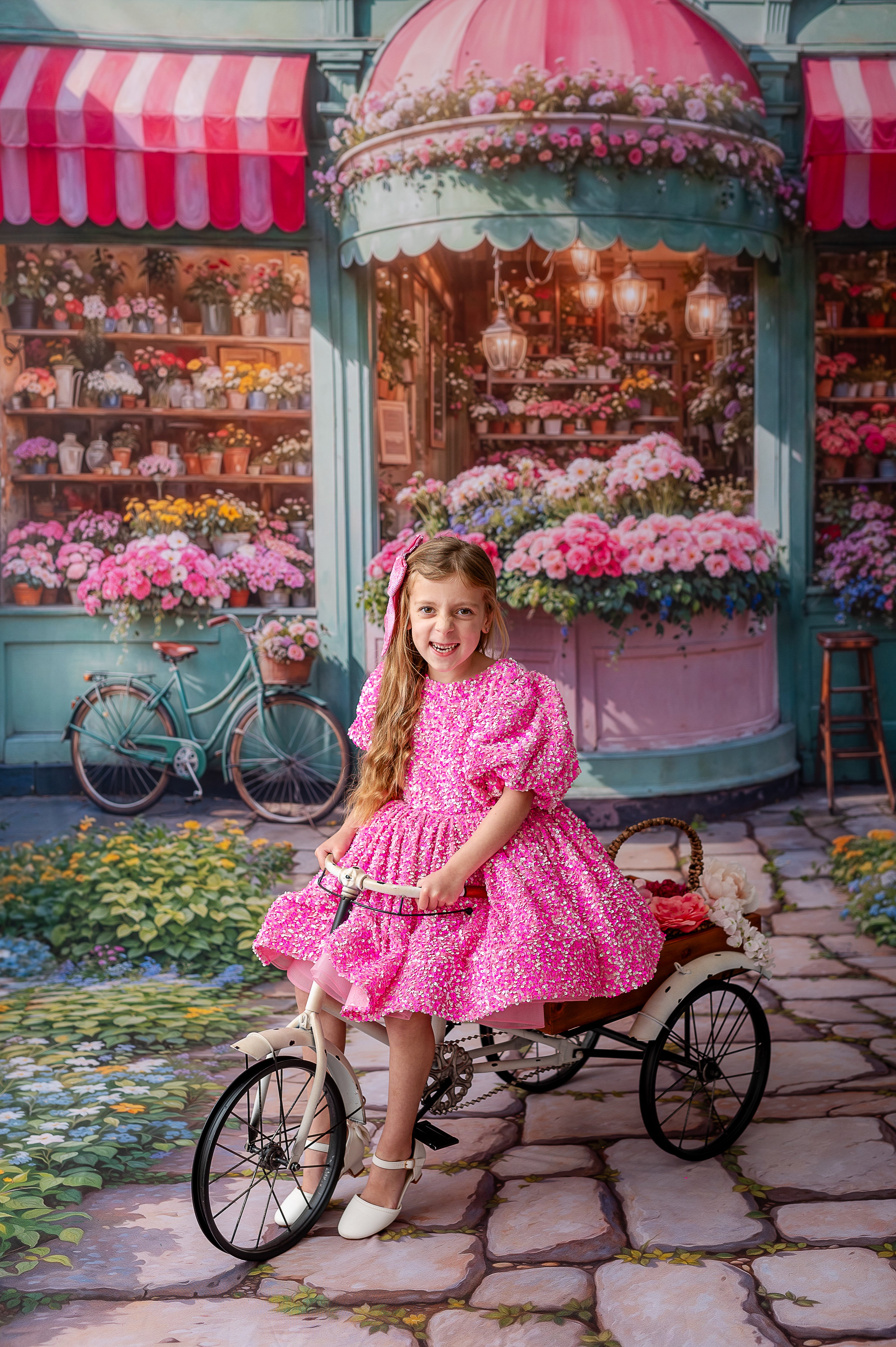 Sparkling pink sequin dress with black lace-trimmed tulle for a vintage-inspired look.
