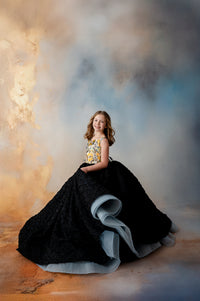 Floor-length gown featuring a dazzling butterfly motif on the bodice, paired with a stunning black skirt for a striking contrast.