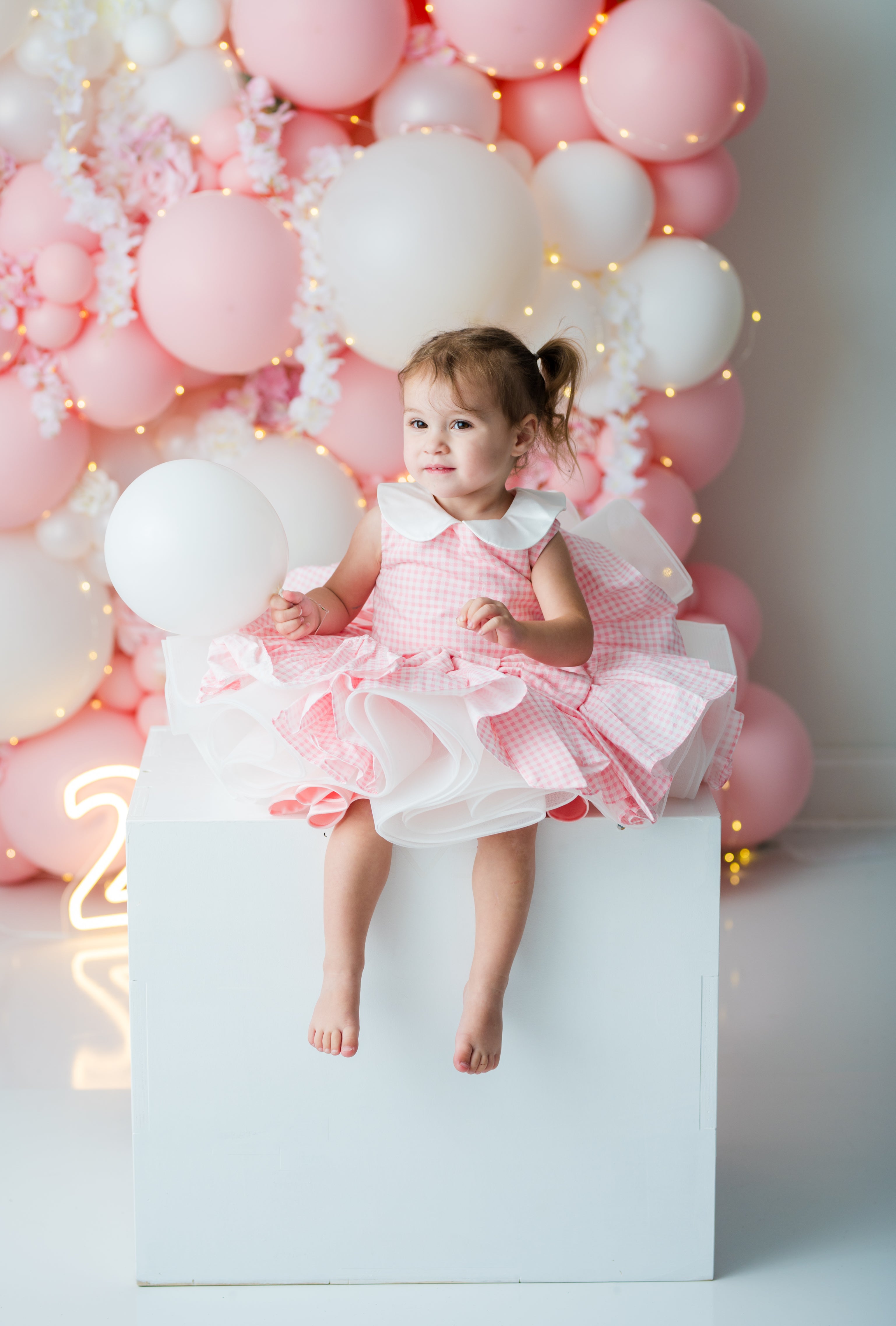Peachy pink satin girls dress with white Peter Pan collar