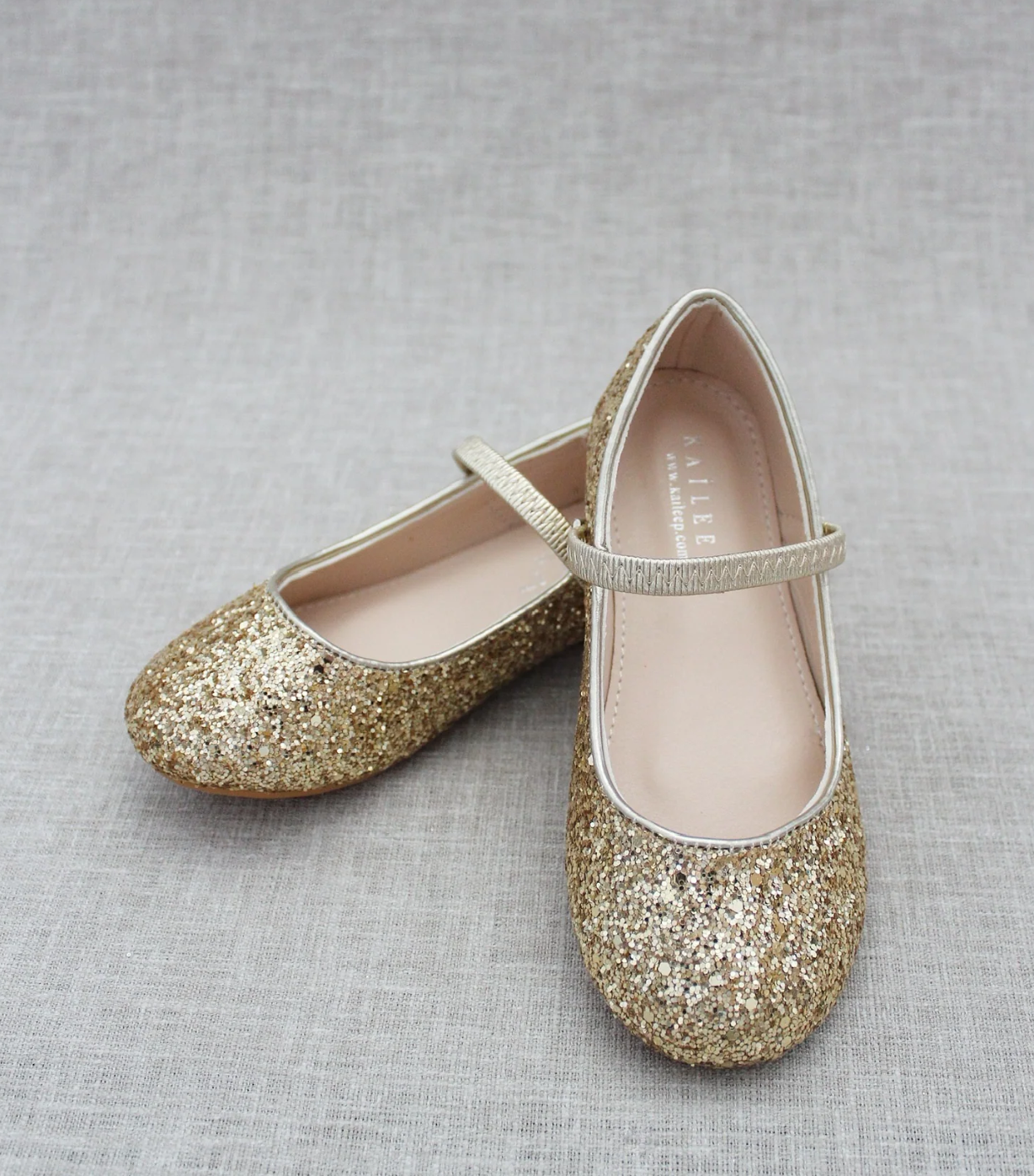 KAILEE P ballet flats featuring an allover rock glitter design with a matching satin bow, perfect for little girls' special occasions and photo sessions.