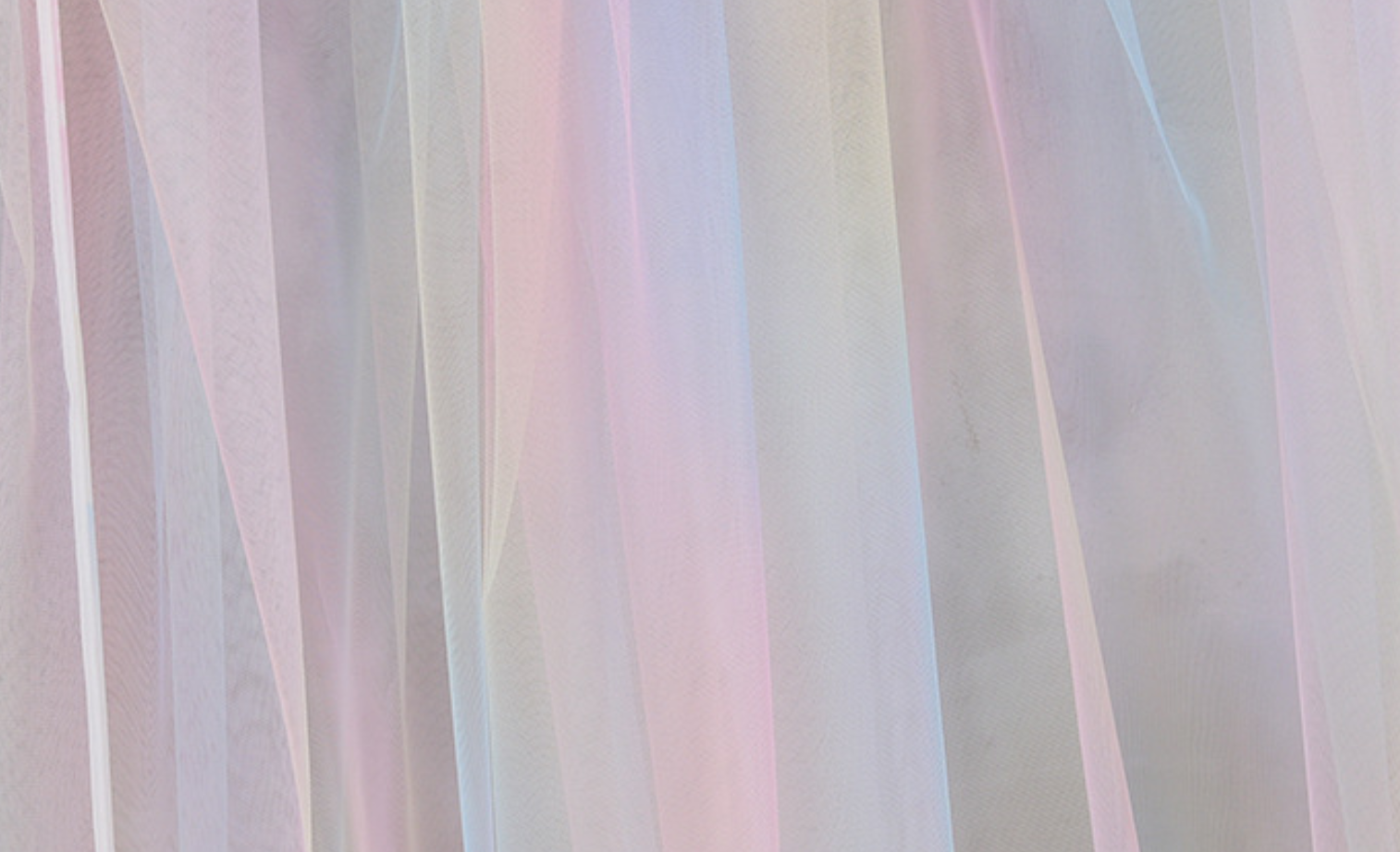 Customizable pastel rainbow gown featuring detachable tulle sleeves and a flattering silhouette.
