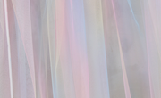 Customizable pastel rainbow gown featuring detachable tulle sleeves and a flattering silhouette.
