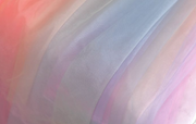 Chasing Rainbows dress in soft pastel hues with detachable tulle sleeves, designed for elegance.
