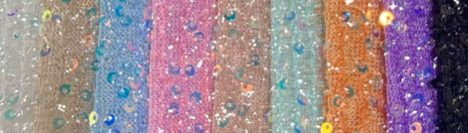 Gradient of glittery ribbons in various colors