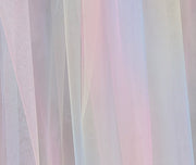 Sheer fabric with a soft gradient of pink and purple hues.