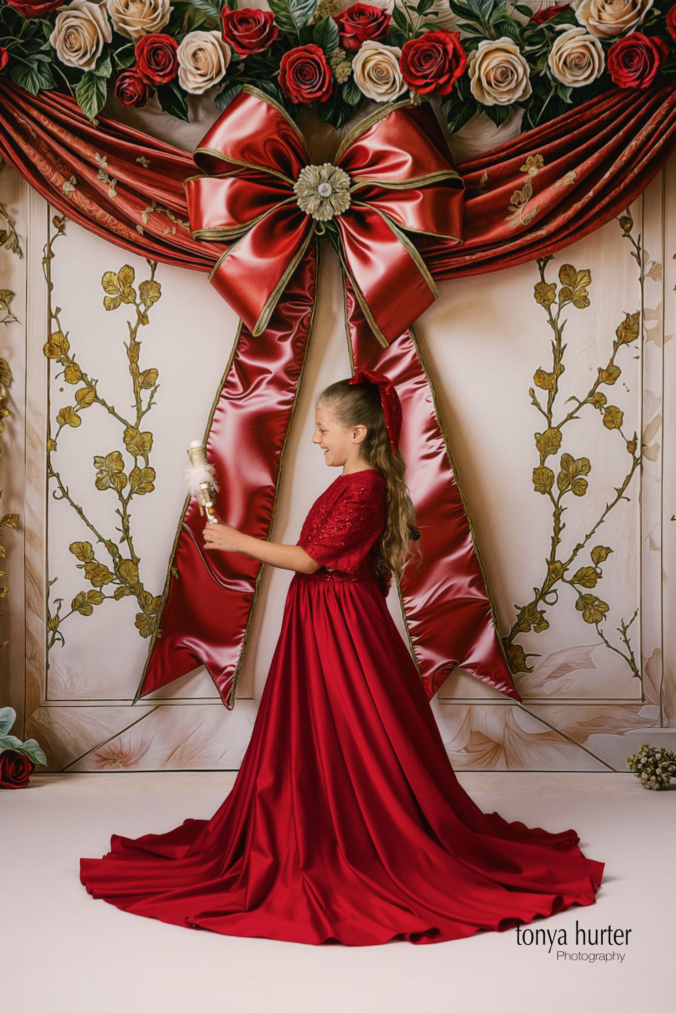 Back view of Scarlet Sparkle gown with elegant bow details

