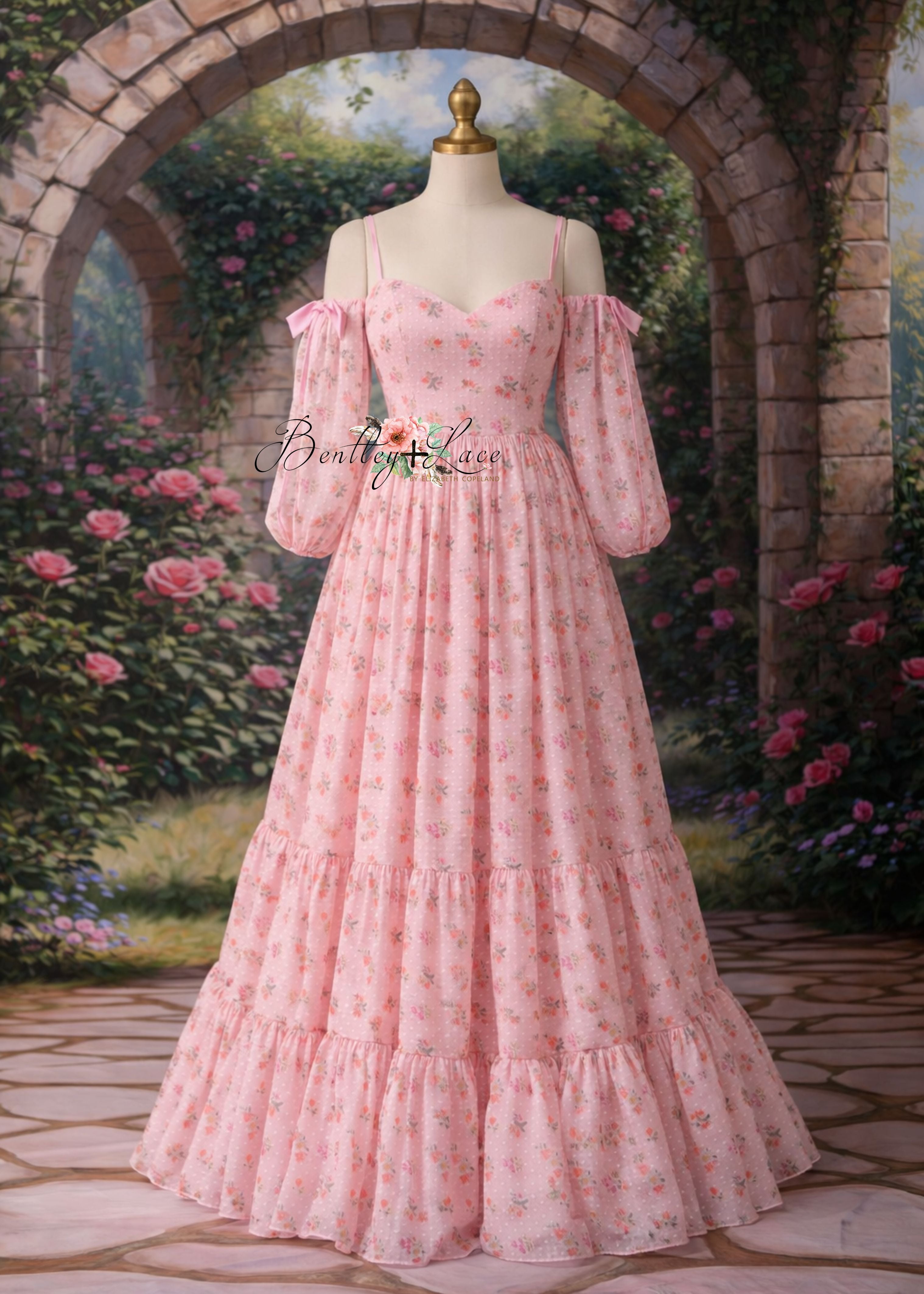 Pink floral dress on a mannequin against a garden backdrop