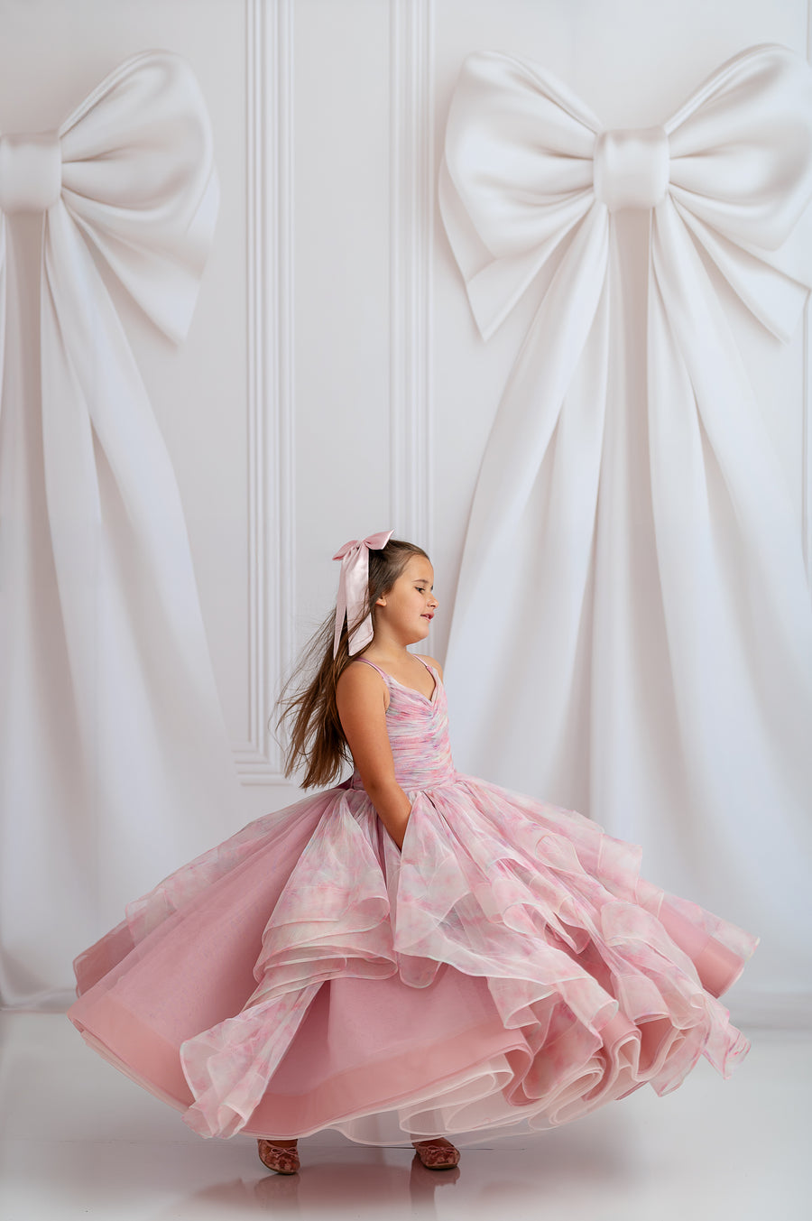 "Custom pastel girls gown with layered tulle skirt and whimsical cloud-inspired design"


