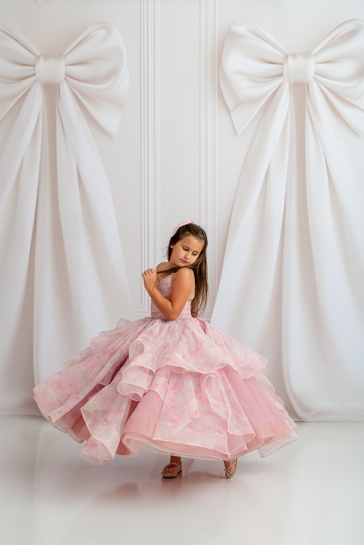 "Back view of Pastel Clouds Gown showing light, airy layers and flowy movement"

